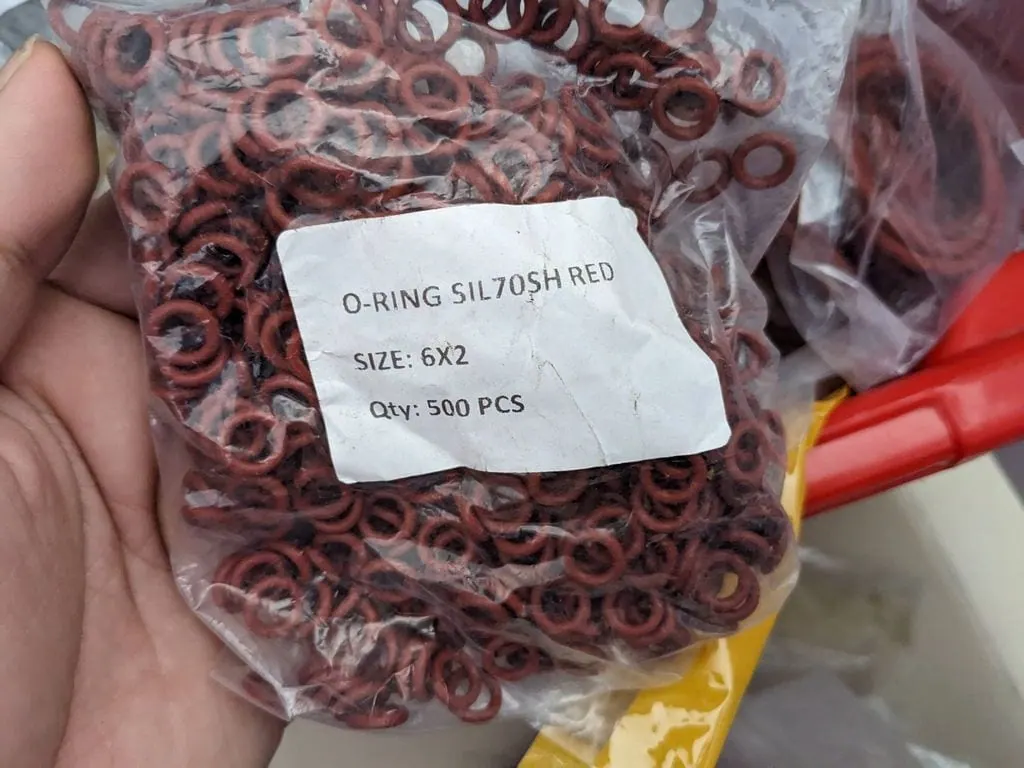 Túi oring silicone đỏ gạch nhiều vòng dán nhãn